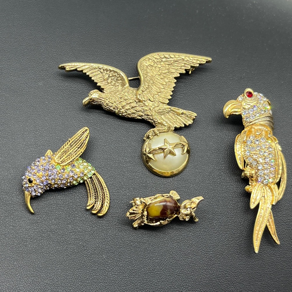 4 bird pins, Monet Hummingbird, 1928 Eagle, Gerry’s Owl and unsigned Parrot